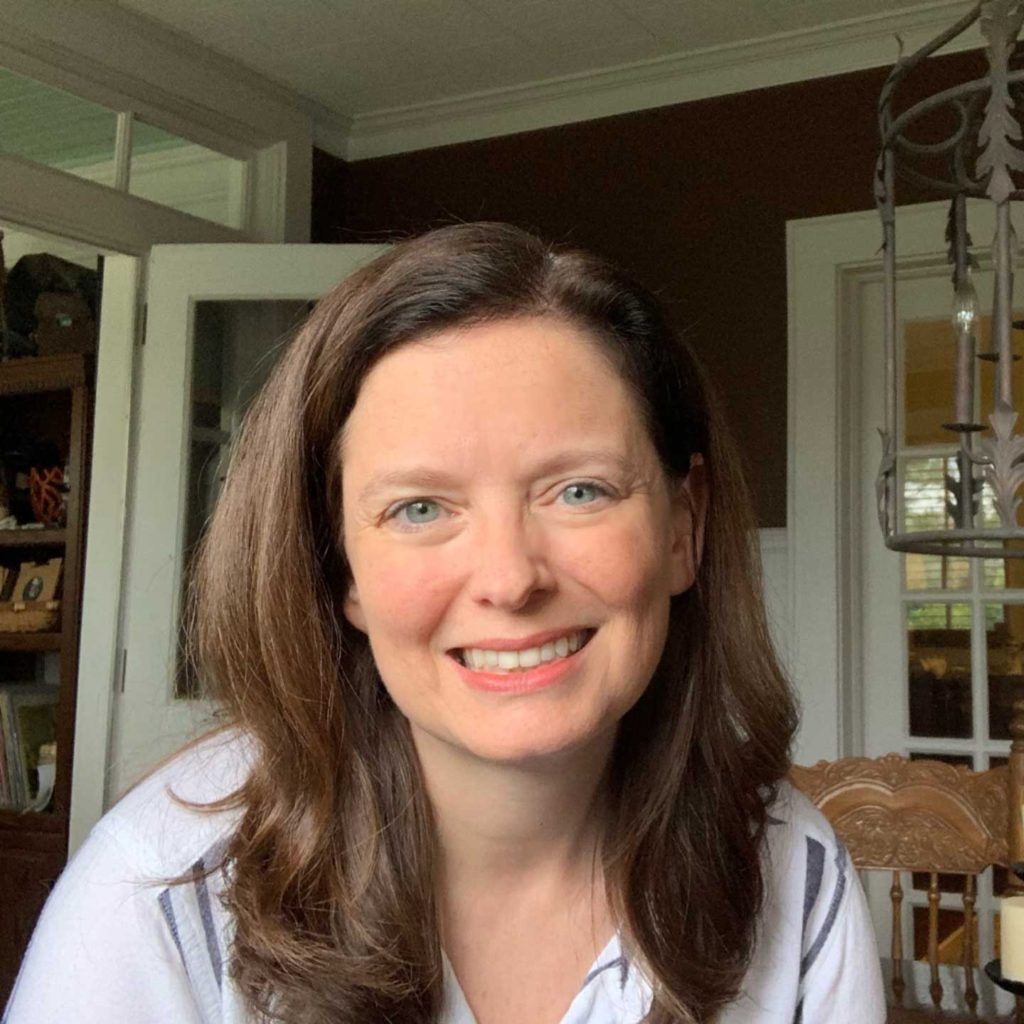 A photo of Laurie Dennison, a white woman with light brown hair